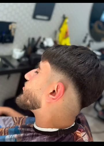 Fade met strak afgelijnde baard
